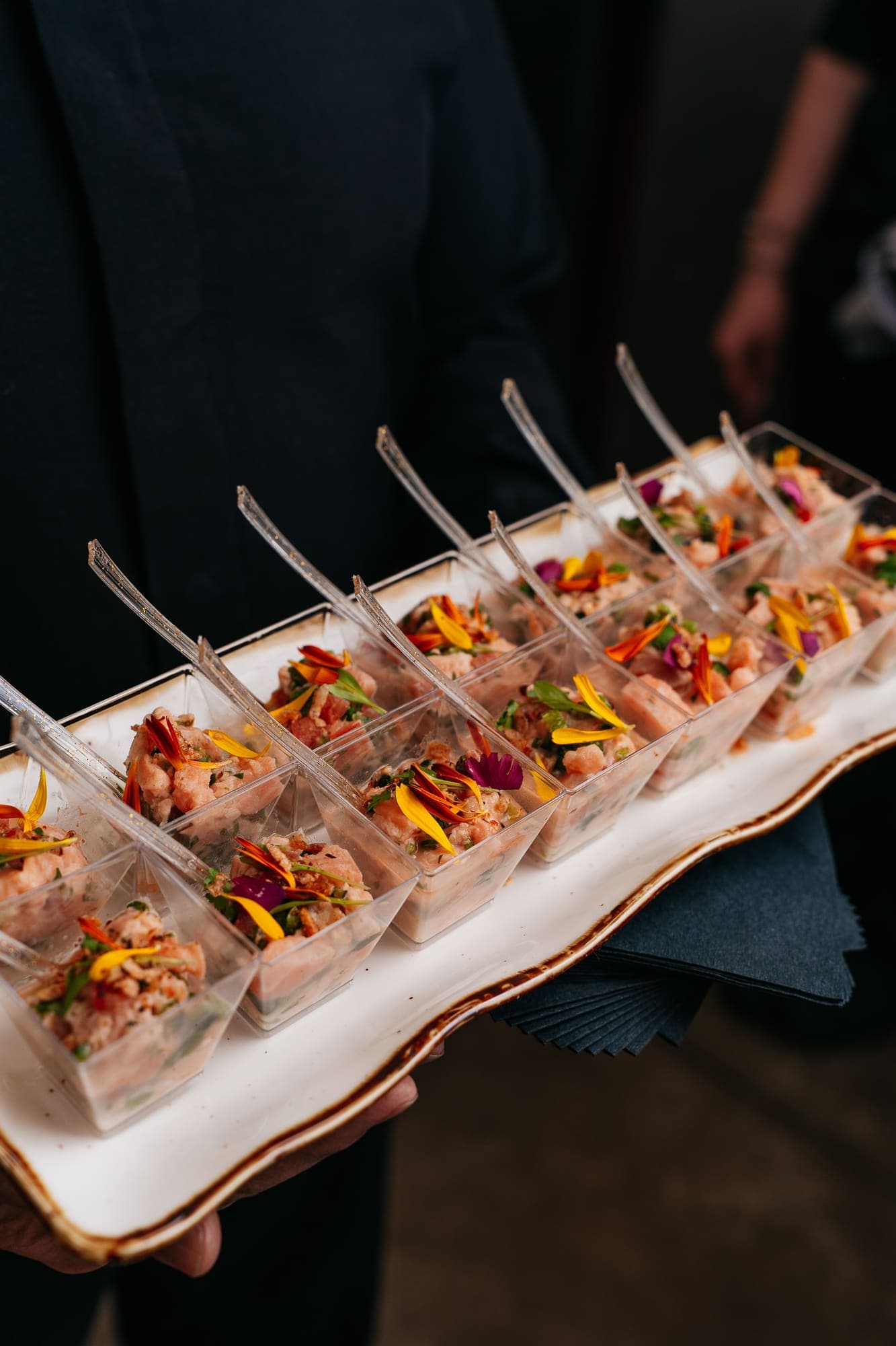 Gulf ceviche cups garnished with citrus and herbs